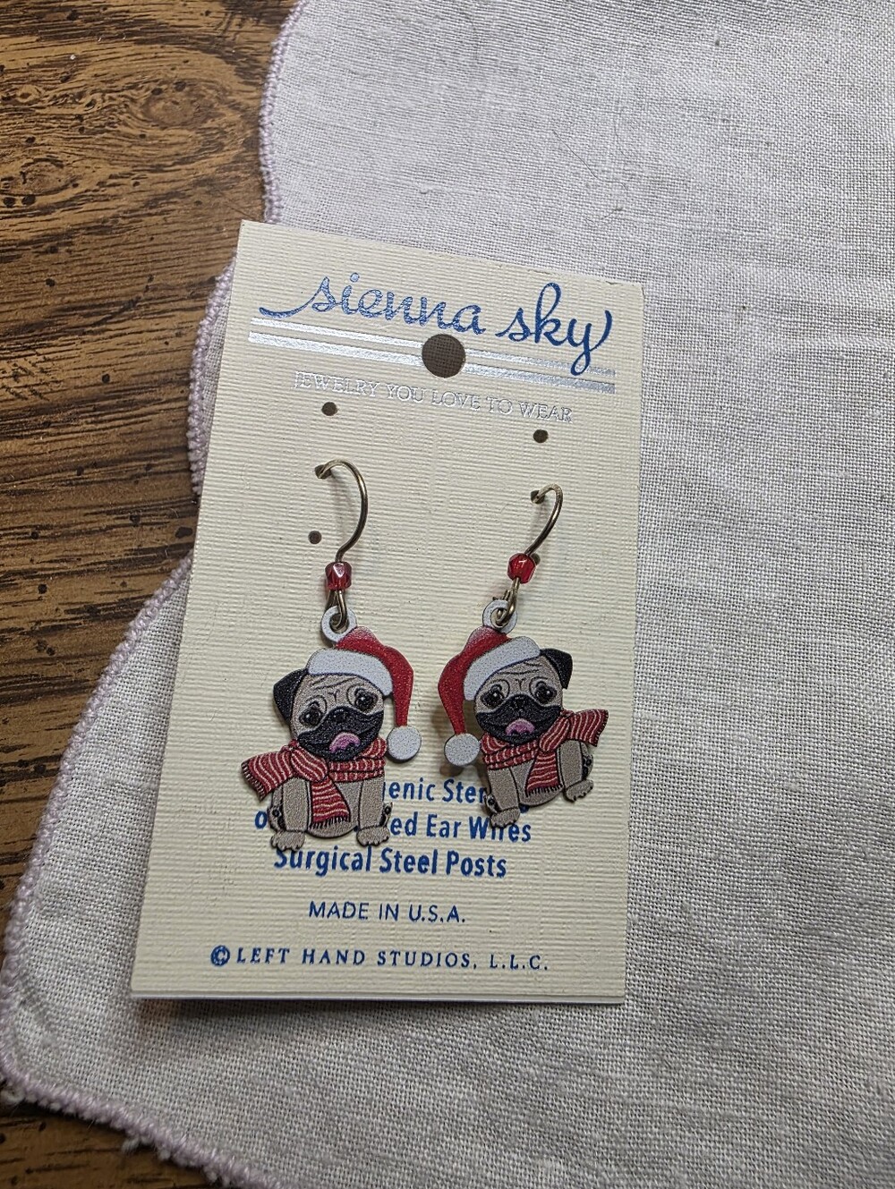 Sienna Sky Pug Earrings with Red Santa Hats and Striped Scarves